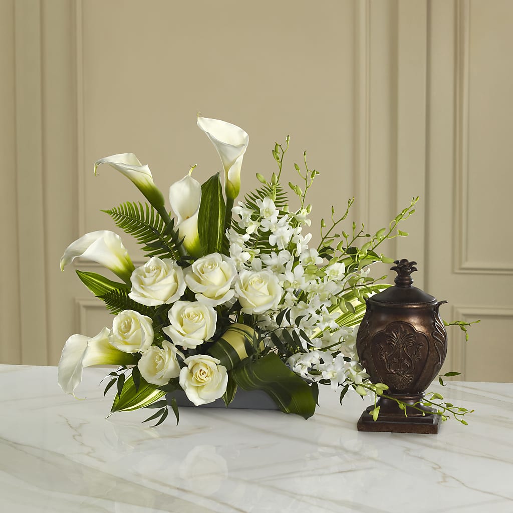 bird of paradise vs peace lily At Peace Arrangement – white flower arrangement | Bristol, PA